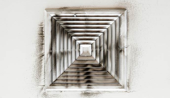 A dirty vent shows soot streaks
