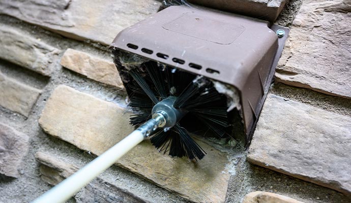 dryer vent being cleaned with spinning brush dryer vent cleaning