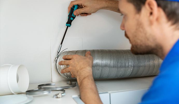 Professional duct installation service Expert technician performing duct installation service