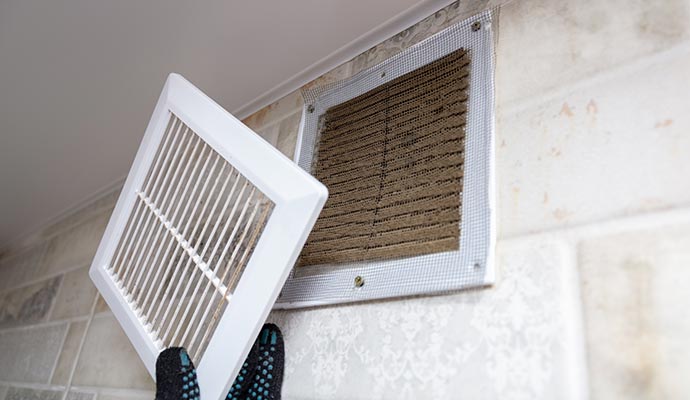 Air duct is cleaning by workers